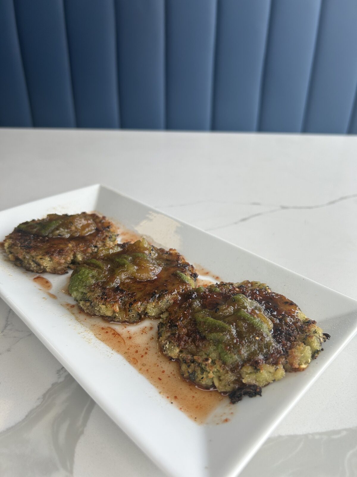 Hara bhara kabab — spinach and green pea patties with tamarind glaze