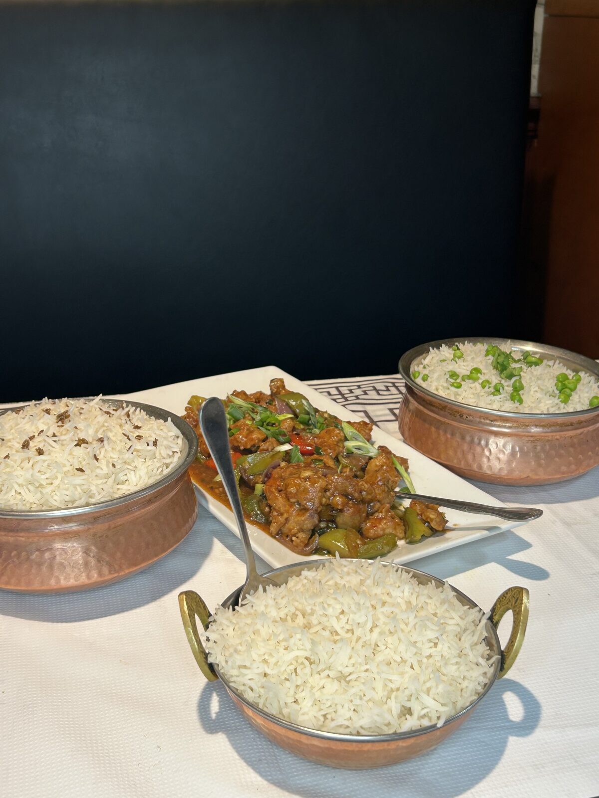 Chilli chicken served with jeera rice and steamed basmati